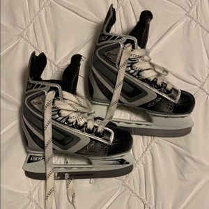 Junior boys ice skate